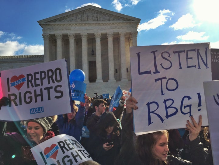 Pro-choice advocates face off against anti-abortion supporters during a rally at the Supreme Court on March 2, 2016, as