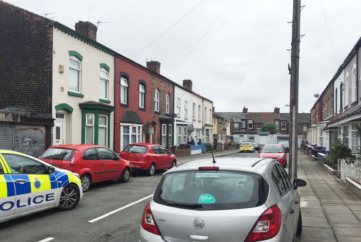 Police at the scene in Cathedral Road in Anfield, Liverpool, as a man has been arrested on suspicion of murder after two women were found dead in a house.
