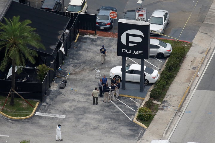 Investigators work the scene following a mass shooting at Pulse, a gay nightclub in Orlando, Florida, on June 12. ISIS claimed responsibility for the attack, but didn't direct it.