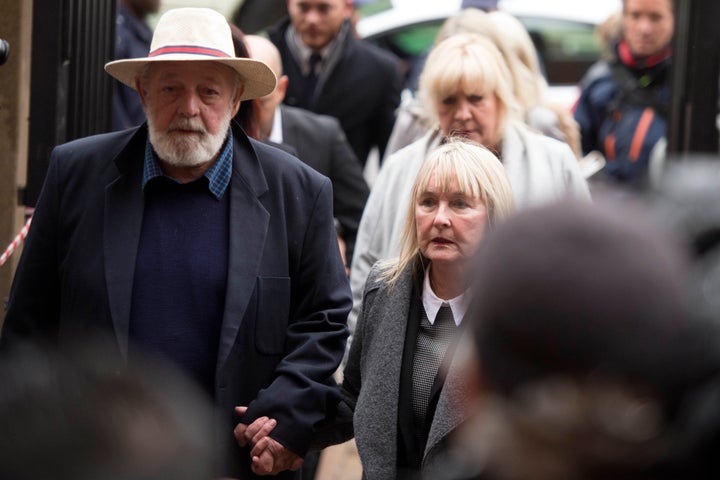 Barry and June Steenkamp, parents of murdered Reeva, are seen arriving for Pistorius' sentencing on Monday.