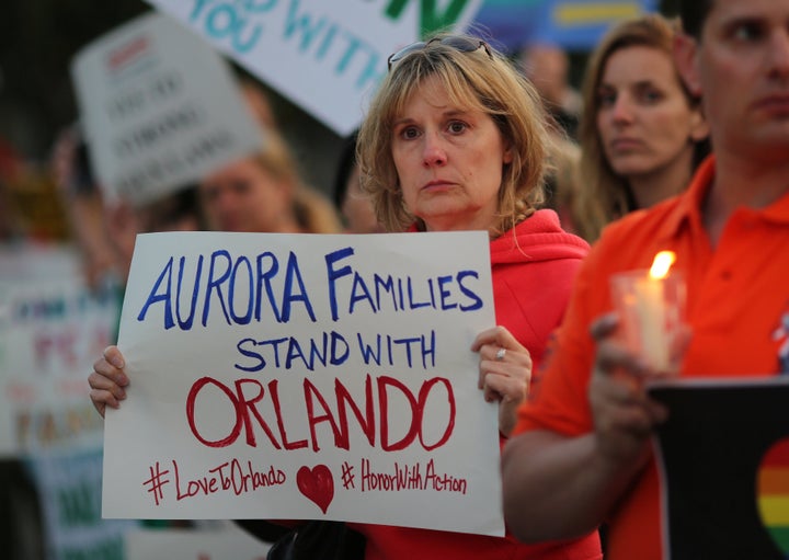 Anita Busch, who says her cousin Micayla Medek, 23, was killed in the mass shooting in Aurora, Colorado, attends a candlelight vigil in West Hollywood, California, following the Orlando shooting.