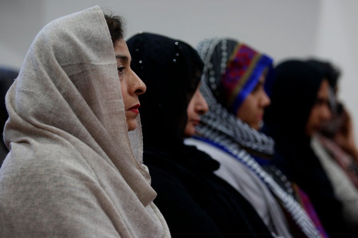 In the wake of this morning's shooting in Orlando, Farhat Naeem, left, attends an Ahmadiyya Muslim Community prayer vigil for the victims, at Baitul Hameed Mosque in Chino, CA June 12, 2016.