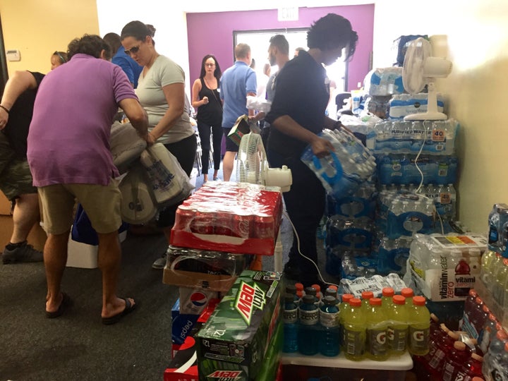 Volunteers at the LGBT Center of Central Florida stack food and water pouring in from locals and area businesses. The co