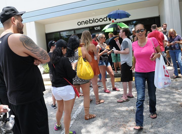 Long lines of people wait at the OneBlood Donation Center to donate blood for the injured victims of the Pulse nightclub shooting on June 12, 2016, in Orlando, Florida.