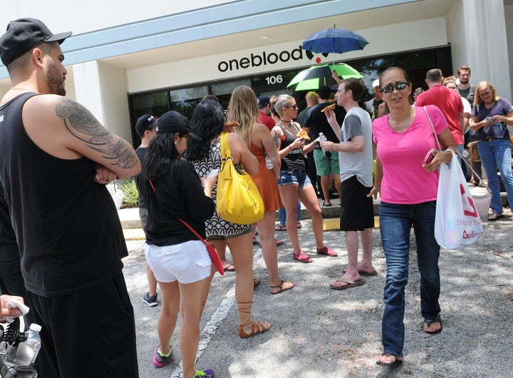 Long lines of people wait at the OneBlood Donation Center to donate blood for the injured victims of the Pulse nightclub shoo