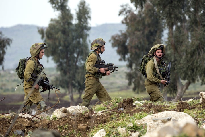 In Israel, the soldiers are heavily armed, but civilians have to clear several tests before they can legally purchase a gun.