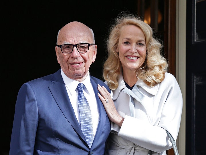 Rupert Murdoch (pictured with wife Jerry Hall) did not decide The Sun's Brexit stance, a senior editor has said