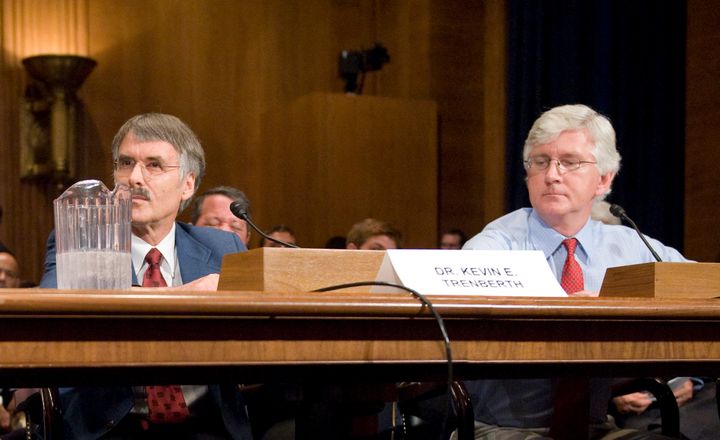 Roy Spencer, right, testifies before a Senate hearing on global warming on July 22, 2008.