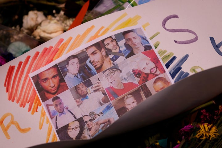 ORLANDO, FL - JUNE 14: Flowers and photographs for the victims of the Pulse Nightclub shooting lay at a makeshift memorial, June 14, 2016 in Orlando, Florida. The shooting, which killed 49 people and injured 53, is the worst mass-shooting event in American history. (Photo by Drew Angerer/Getty Images)