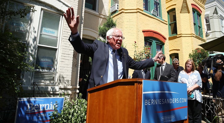 Democratic Presidential Candidate Bernie Sanders speaks to the media outside of his campaign headquarters June 14, 2016 in Washington, DC. Sanders is expected to meet with presumptive Democratic Presidential nominee Hillary Clinton in Washington after polls close for the primary in DC.