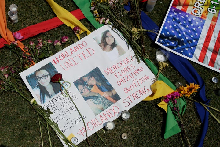 Flowers and messages for the victims of the Pulse Nightclub shooting lay at a makeshift memorial.