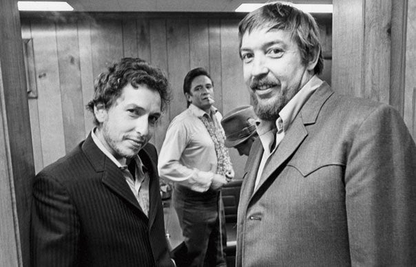 Dylan with Johnny Cash and producer Bob Johnston in 1969.