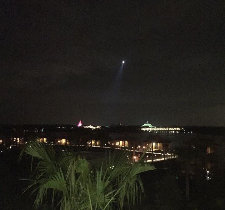 A helicopter searches the waters near Disney's Grand Floridian Resort in Florida on Tuesday.