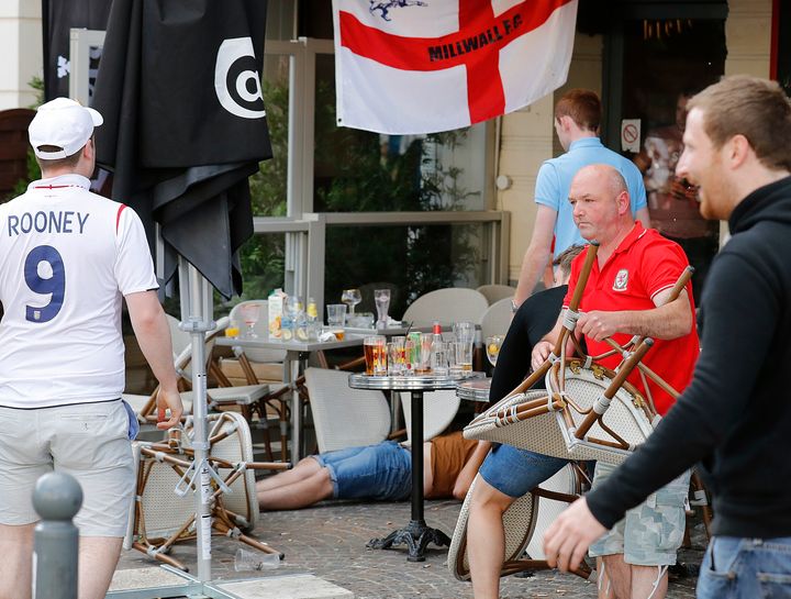 England and Wales fans react after an altercation with Russian supporters 