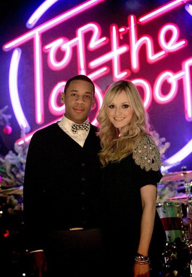 <strong>Reggie still hosts the festive 'TOTP' specials with Fearne Cotton</strong>
