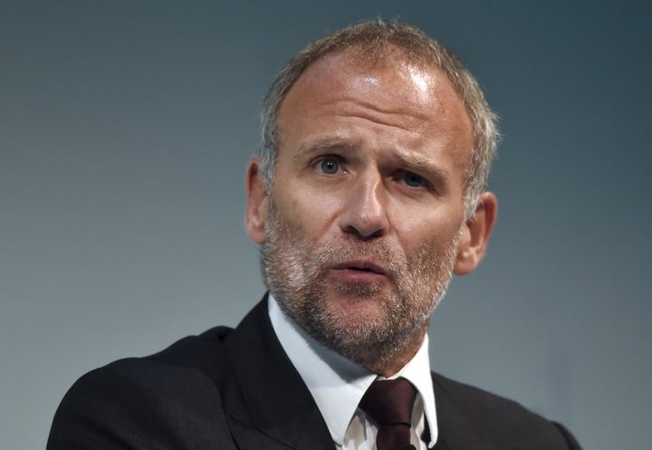 Dave Lewis urged businesses to do more to tackle food waste