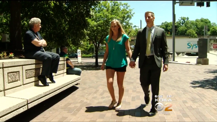 Julie is seen walking hand-in-hand with her new husband, Andrew Nixon, near where she revived the woman.