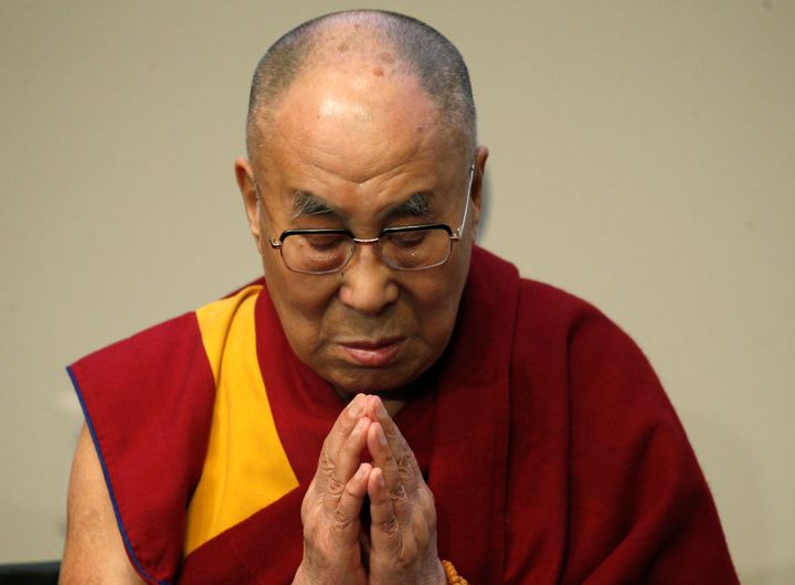 The Dalai Lama prays for the victims of the Orlando shooting before speaking at the U.S. Institute of Peace in Washington, D.C. on June 13, 2016.