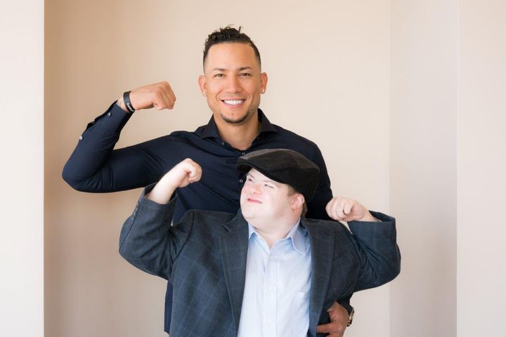 MLB Player Carlos Gonzalez and Author/Self-Advocate Marcus Sikora pose for Down Syndrome World Magazine