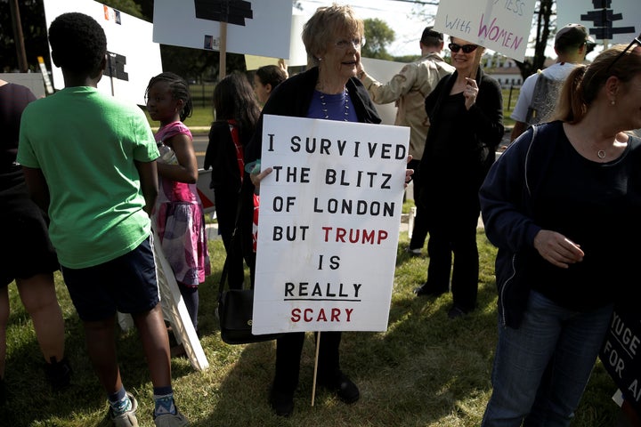 A British woman protests presumptive U.S. Republican presidential nominee Donald Trump in New Jersey on May 19, 2016.