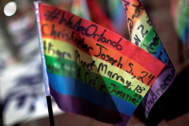 Messages written on rainbow flags are seen placed at a makeshift memorial to remember the victims of the mass shooting at a gay nightclub in Orlando, outside the Stonewall Inn in Manhattan, New York, U.S., June 15, 2016.