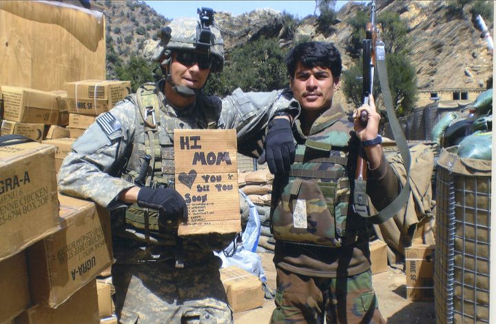 Jason with an Afghan National soldier in Kunar Province in 2008.