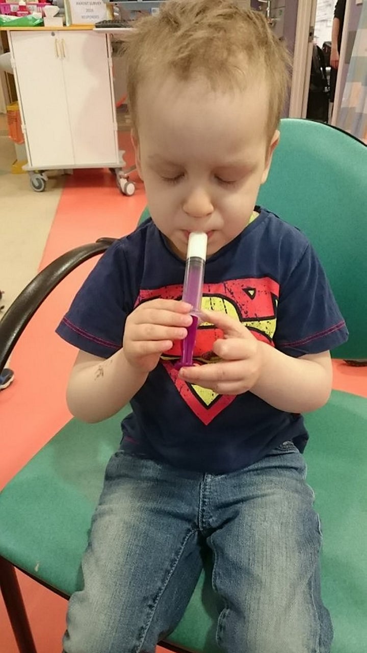 Dylan taking his oral chemotherapy in April 2016