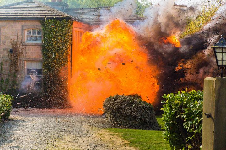 The explosion tears through Mill Cottage
