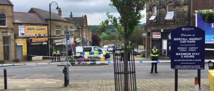 Police near the scene of the incident in Birstall, West Yorkshirte