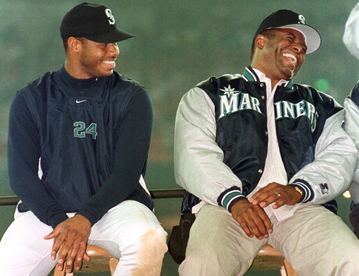 Ken Griffey Jr. and his father laugh together at the Kingdome in Seattle in 1999.