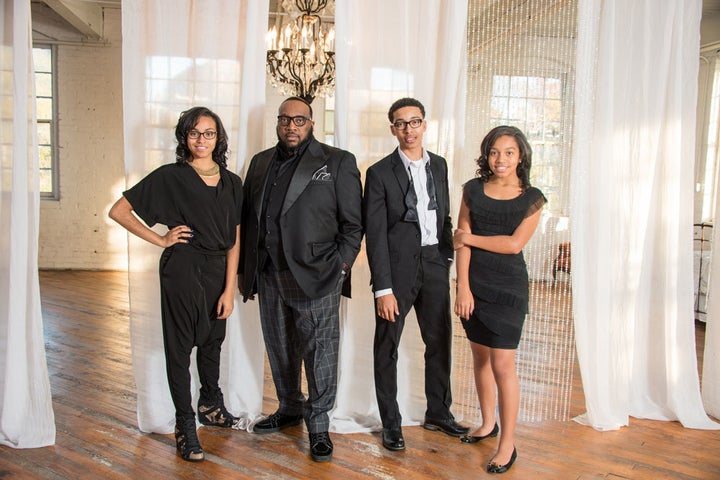 Marvin Sapp with his children, MiKaila, Marvin Jr., and Madisson.