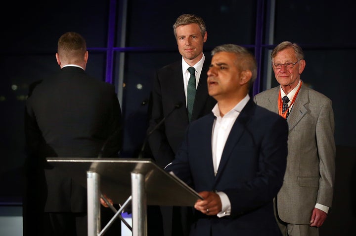 Britain First mayoral candidate, Paul Golding, turns his back as Sadiq Khan, Labour's newly elected London mayor, gives his victory speech. Golding finished eighth out of 12 candidates.