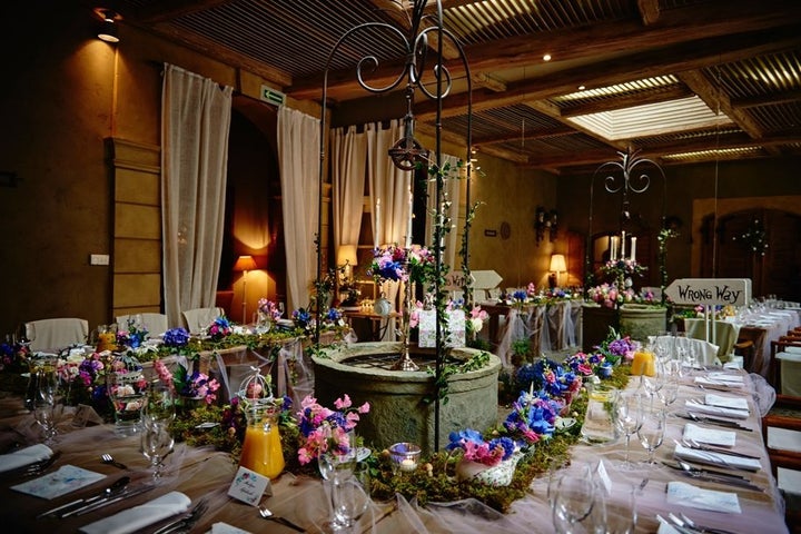 The large mirror beyond the table made it look as though guests were entering another world.