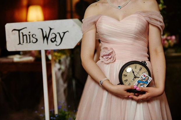 The couple incorporated fun details such as clocks, playing cards and arrow signs into the decor.