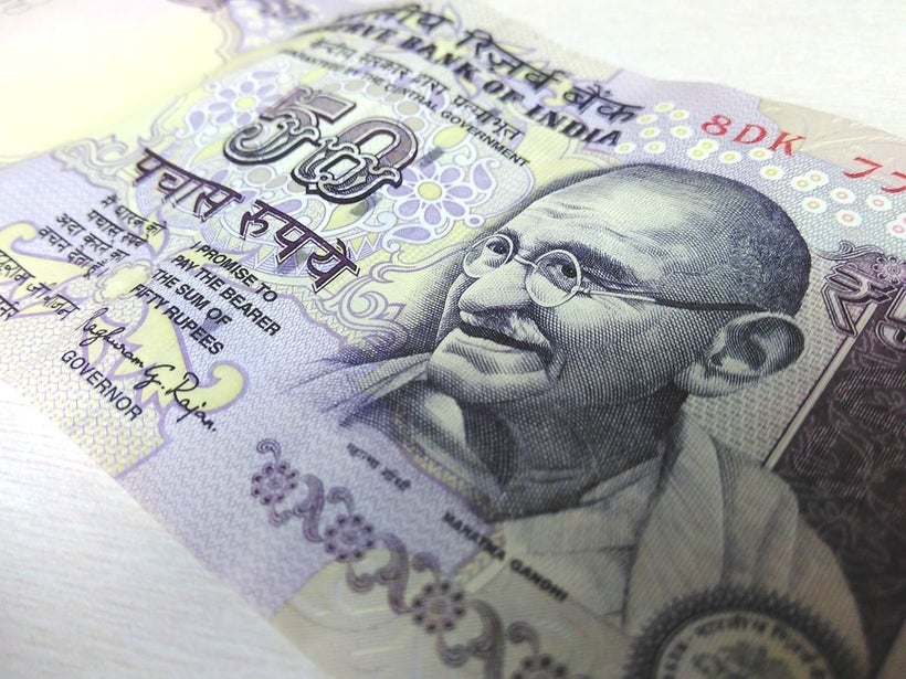 This is Gandhi. Famous lawyer and political leader. He's on all the dam money. 