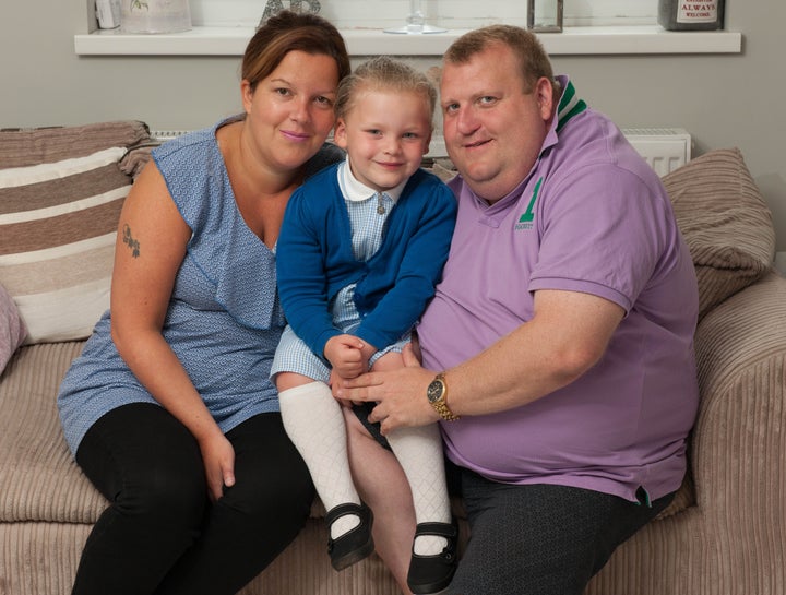 Sadie Brittle, 32, and husband Gary with their four-year-old daughter Summer. 