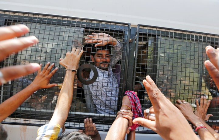 Eleven Hindus will spend the rest of their lives in prison for the mass murder of dozens of Muslims during riots in the state