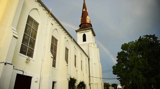 A rainbow appears outside Mother Emanuel church on June 15, 2016, following a bible