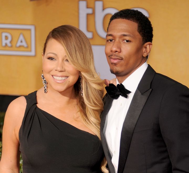 Mariah Carey and Nick Cannon arrive at the 20th Annual Screen Actors Guild Awards on Jan. 18, 2014 in Los Angeles, California.