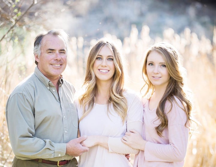 Chloe Mackintosh<i> </i>with her dad and sister.