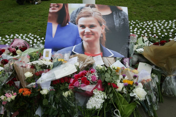 Floral tributes left in Parliament Square, London.