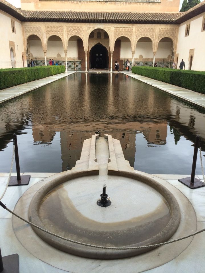 A key-shaped fountain in Alhambra, symbolizing the entrance key to paradise