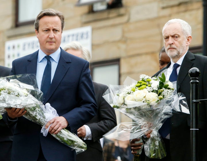 David Cameron and Jeremy Corbyn appeared alongside each other to lay flowers in tribute to Jo Cox, after referendum campaigning was suspended