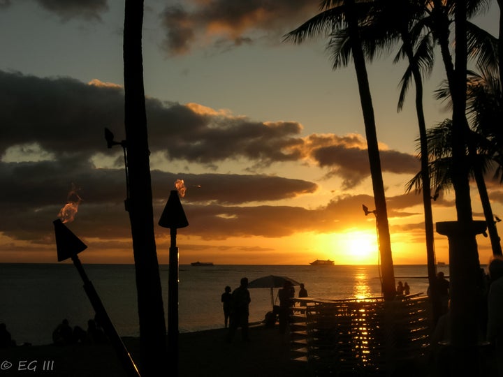 <p><em>Sunset on Waikiki Beach</em></p>