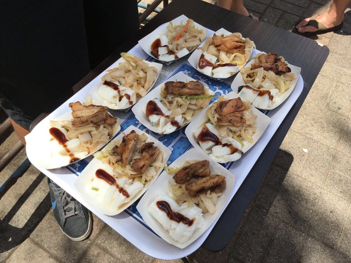 Getting some samples ready for our group on the food tour. YUM.