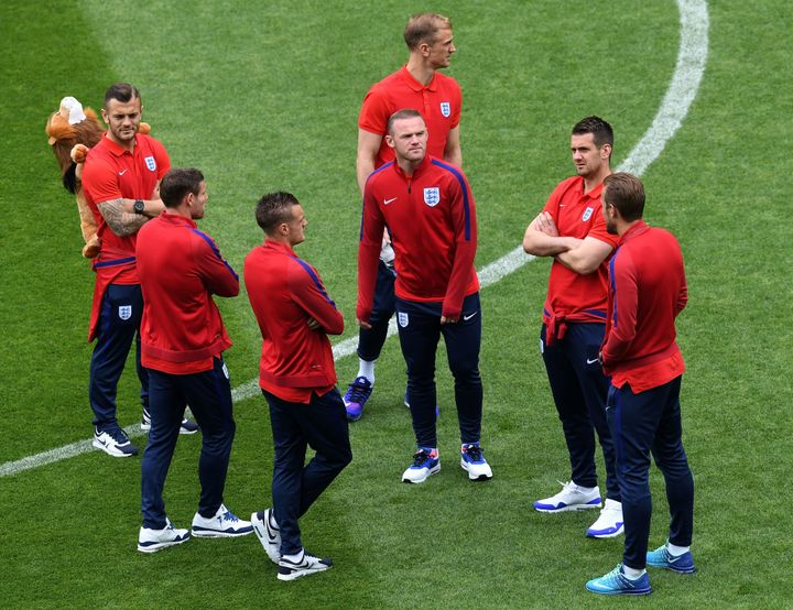 England Vs Slovakia: Wayne Rooney stands with team mates at Saint Etienne on Sunday