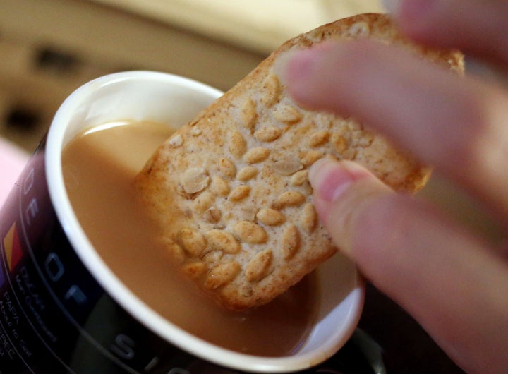 A Belvita breakfast biscuit with a cup of tea. 