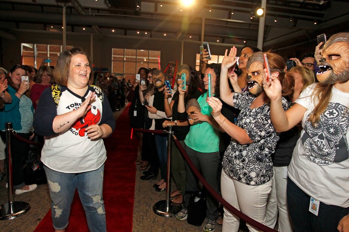 The custom toy was presented during a visit to Hasbro's Rhode Island headquarters on Friday. She's seen greeting some of the employees.