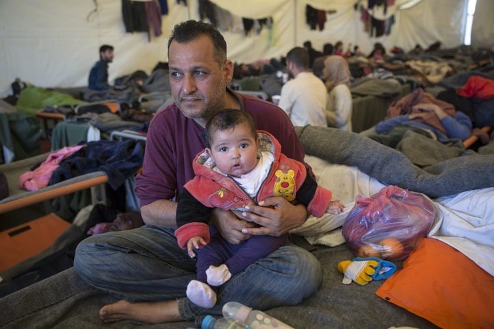 Moayad Saad, a civil servant from Baghdad, Iraq, with his seven-month-old daughter Zehraa. "We are always together," he sai