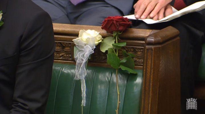 Cox was remembered in Parliament yesterday with a white and red rose placed on the bench where she used to sit 
